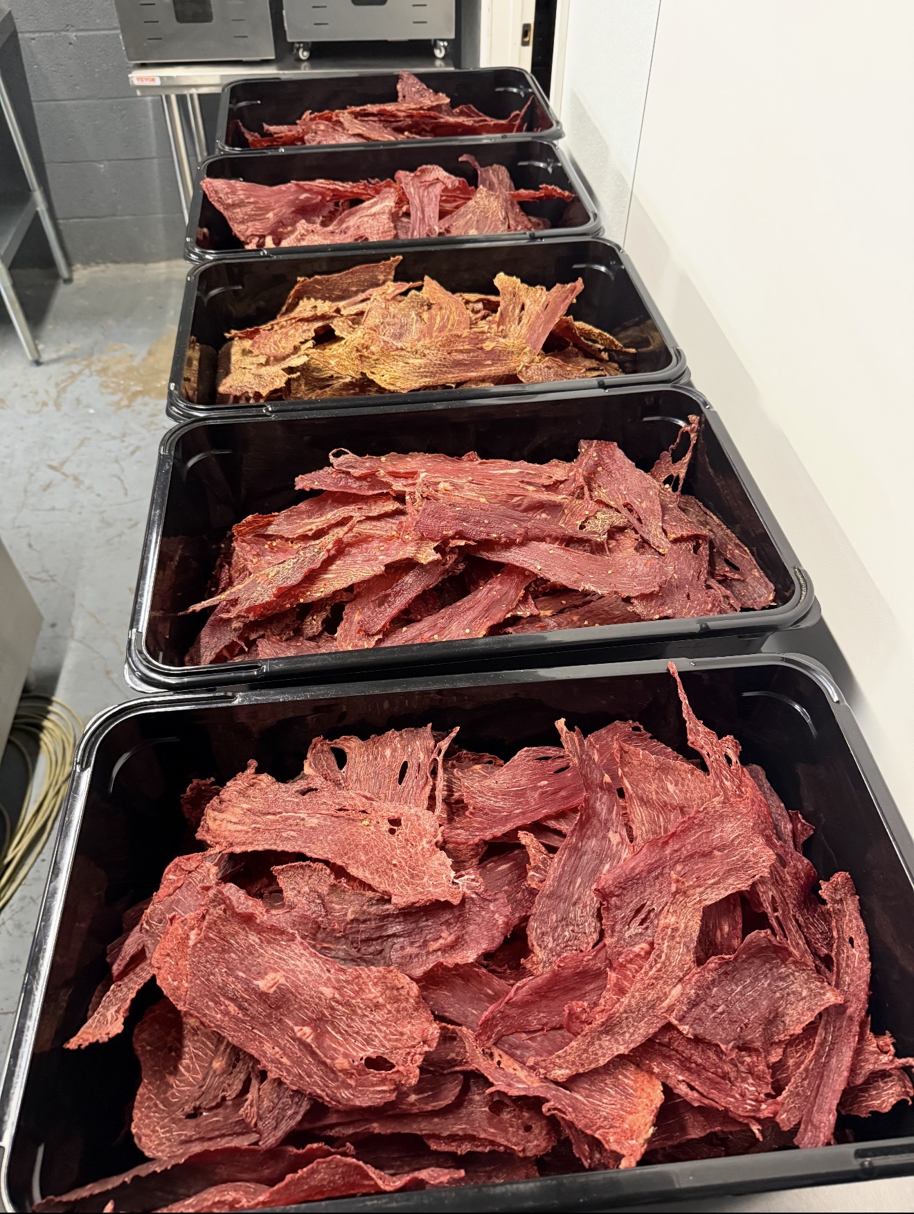 Fresh trays of hand-cut jerky in the Amarillo kitchen
