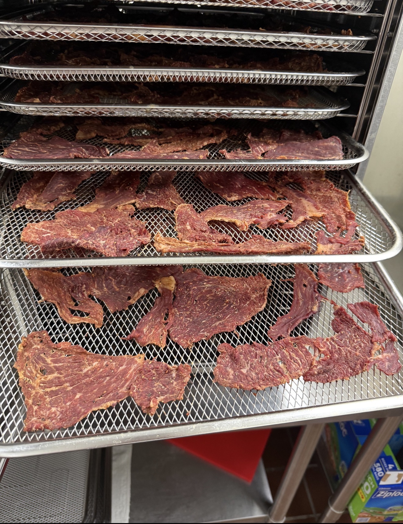 Trays of jerky drying at the Amarillo shop